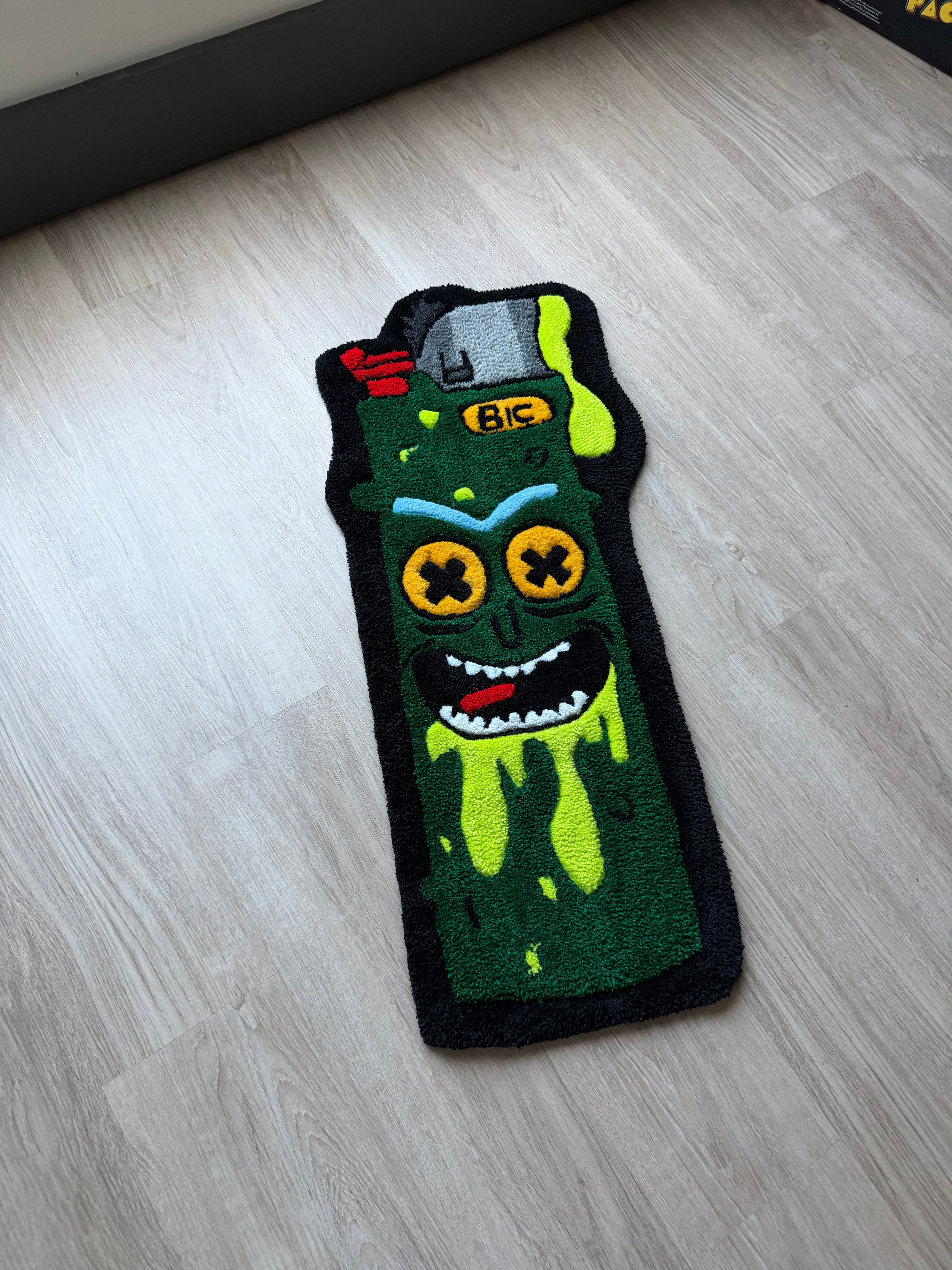 “PICKLE RICK LIGHTER RUG”