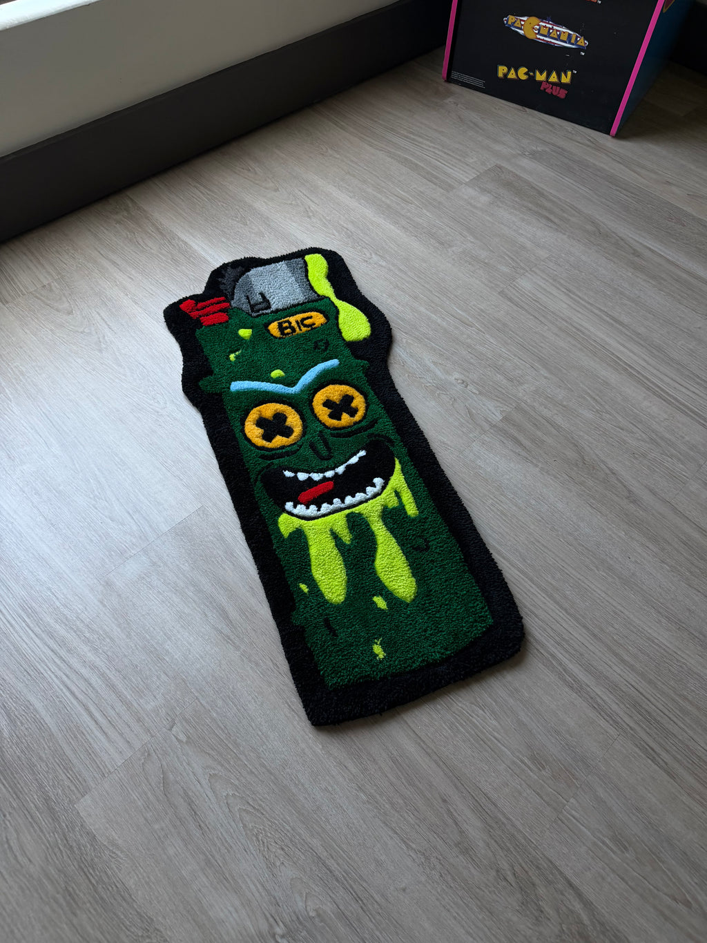 “PICKLE RICK LIGHTER RUG”