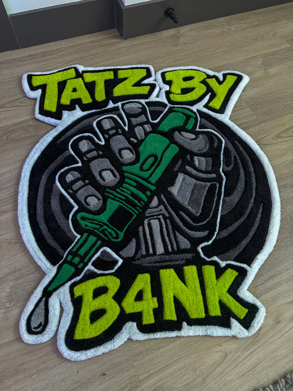 “TATZ BY B4NK”