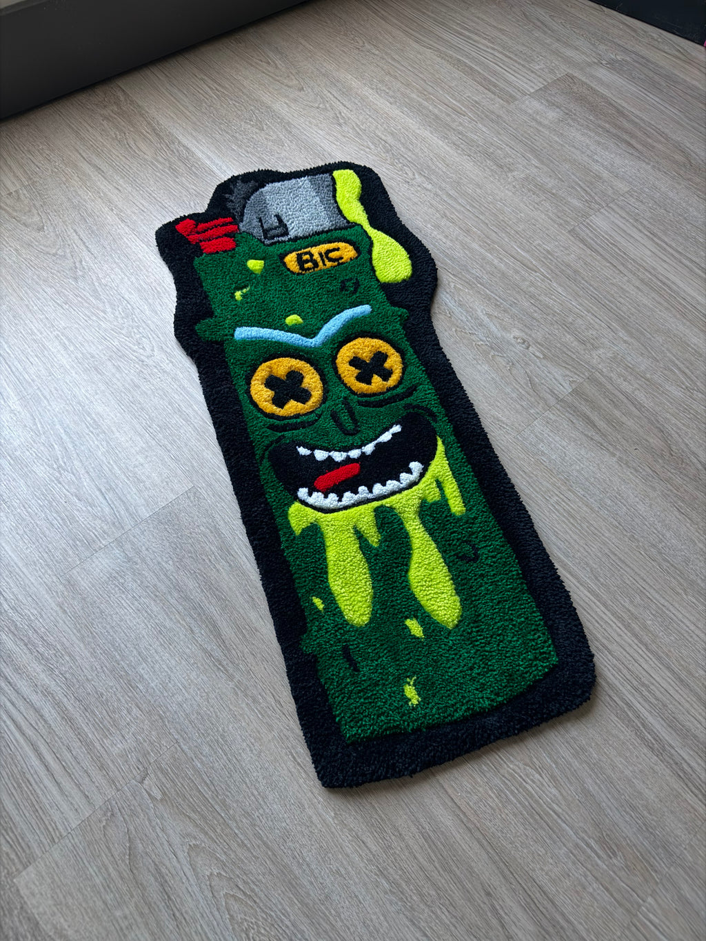 “PICKLE RICK LIGHTER RUG”