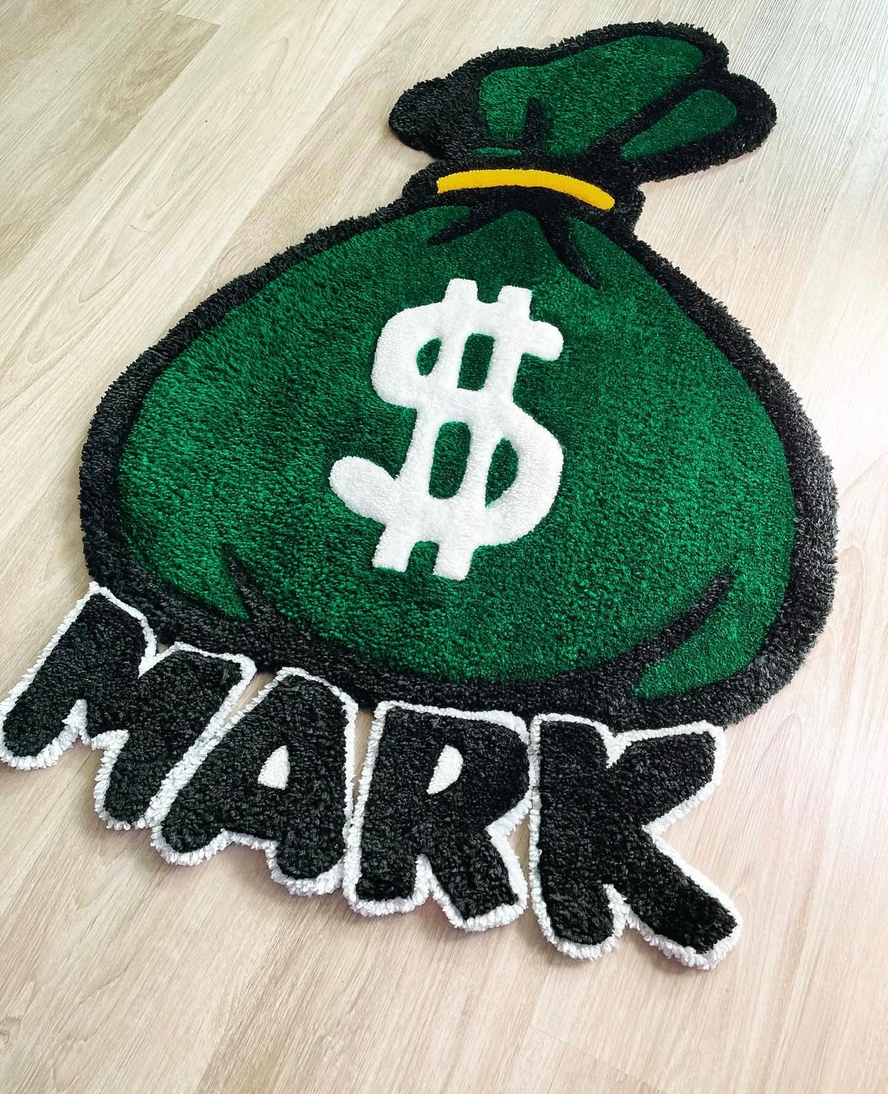 “MONEYBAG RUG”